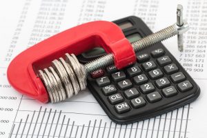 Islamorada Credit Card Debt Management Canva Coins and Calculator on a Invoice 2 300x200