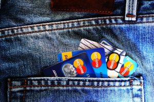 Keystone Heights Credit Card Debt Management blue master card on denim pocket 164571 300x200